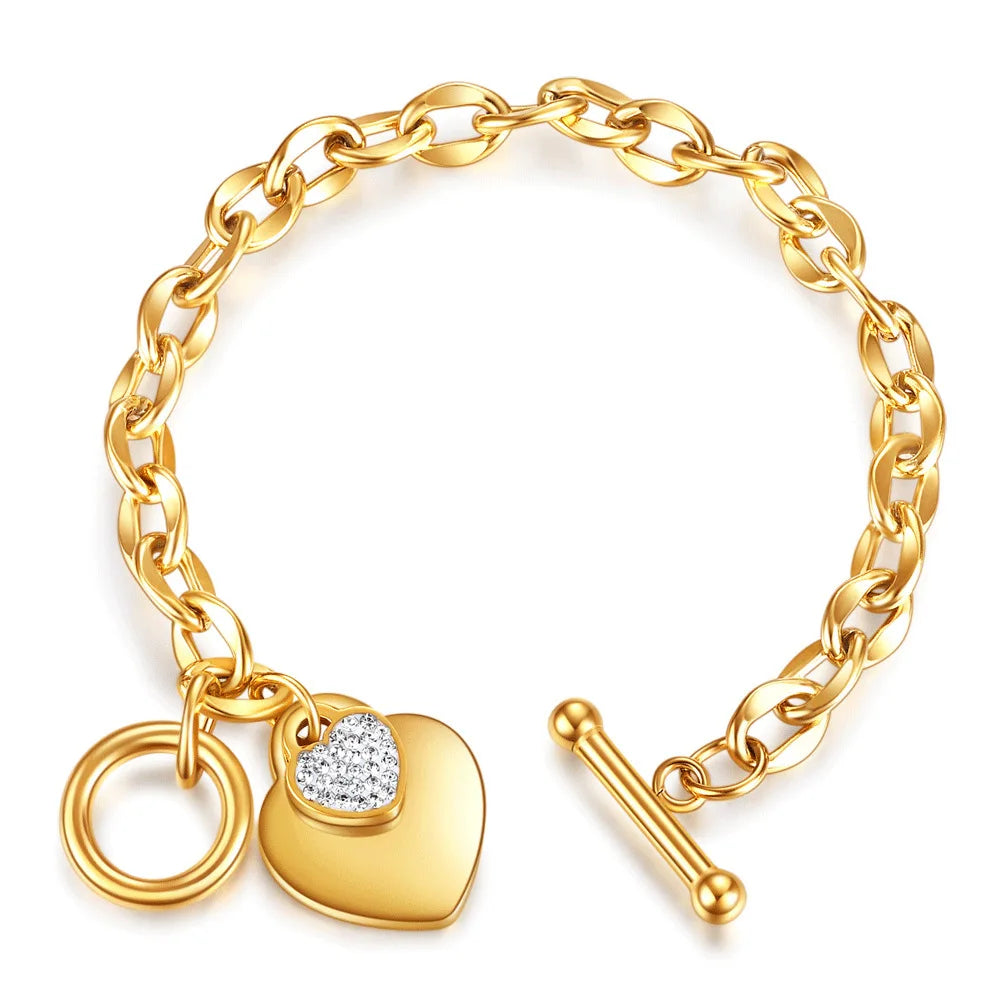 Explore our collection of waterproof geometric heart pendant bracelets and bangles for women and girls. Crafted from 316L stainless steel and plated with gold, these accessories are designed to retain their shine and shape over time