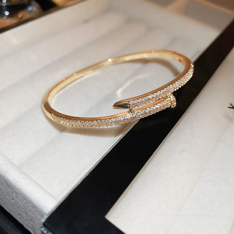 Luxurious and elegant, the 2024 New Korean Bangle embodies the essence of European and American fashion. This simple yet dazzling bracelet is the epitome of chic jewelry for women's parties and special occasions.